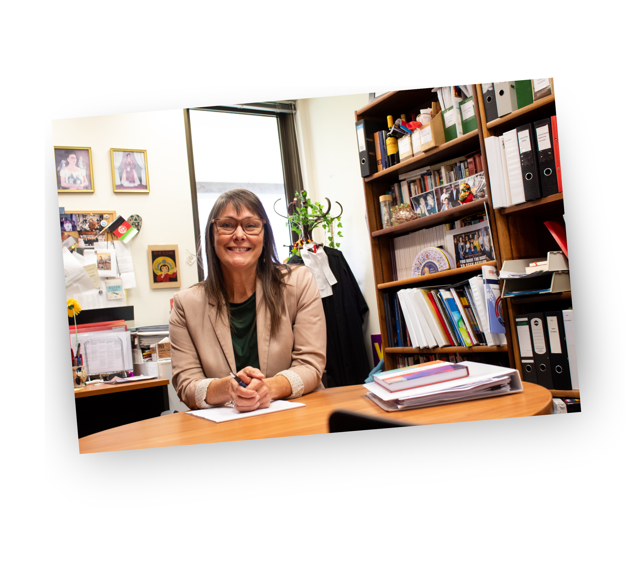 Image of Anna Copeland sitting in her office in the SCALES clinic 